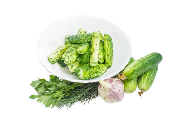Lightly salted cucumbers and ingradients for their preparation — Stock Photo, Image