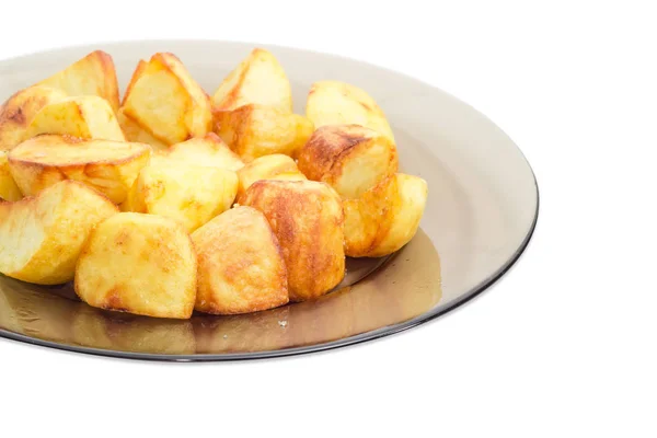 Patatas fritas en el plato de vidrio oscuro — Foto de Stock
