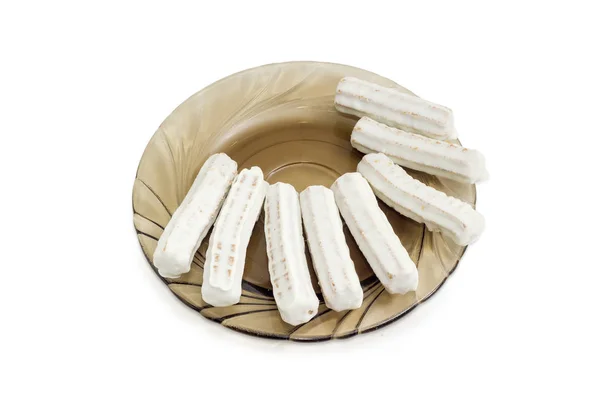 Biscoitos em forma de paus revestidos com chocolate branco — Fotografia de Stock