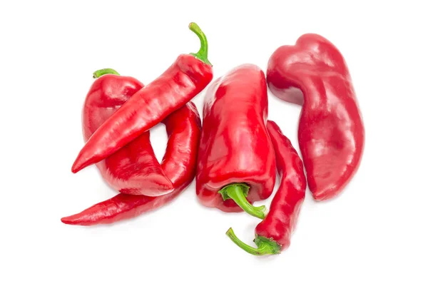 Piros paprika és a chili, fehér alapon — Stock Fotó