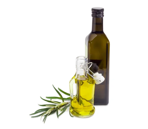 Dos botellas de aceite de oliva y rama de olivo — Foto de Stock