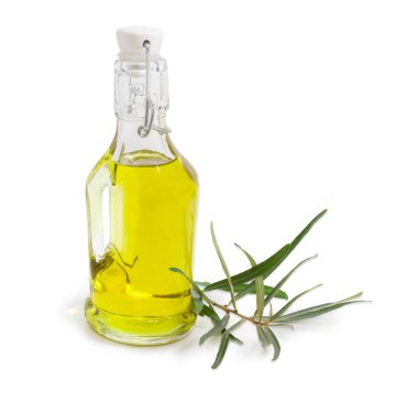 bir şişe zeytinyağı ve zeytin dalı