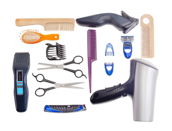 Conjunto de ferramentas de cabeleireiro em um fundo branco — Fotografia de Stock