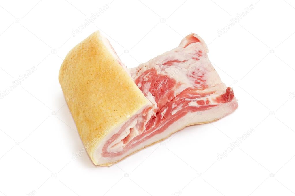 Piece of pork belly with skin in salt