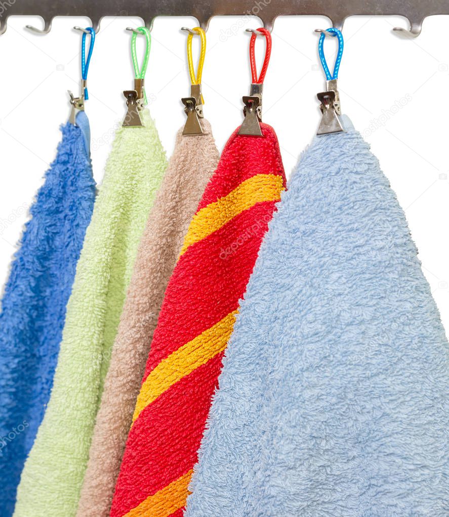 Towels with clothespins on a hooks of hanger