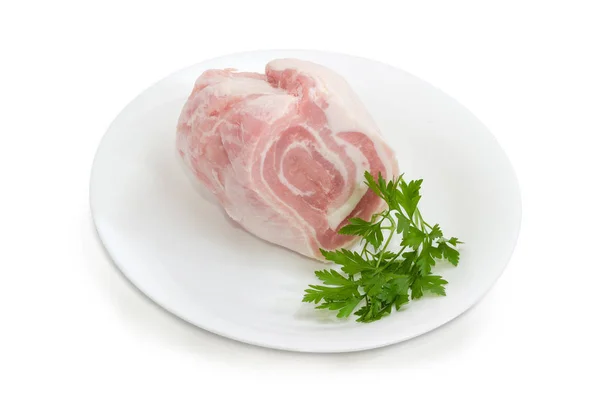 Roh gestreifter Schweinebauch mit Petersilienzweigen — Stockfoto