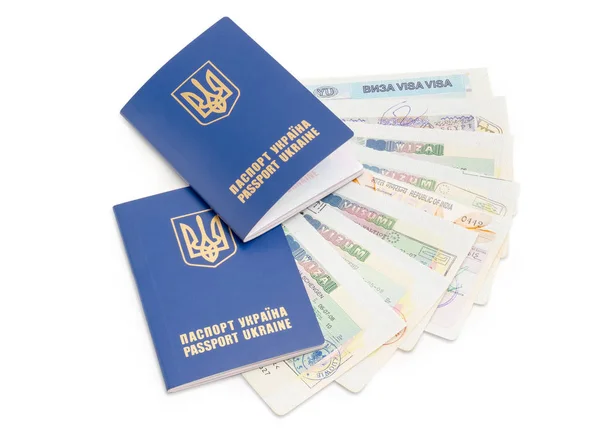 Passaporti ucraini su uno sfondo di visti di viaggio — Foto Stock
