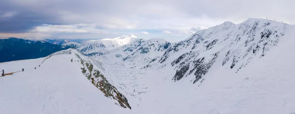 Panorama of Low Tatras mountains in cloudy winter day