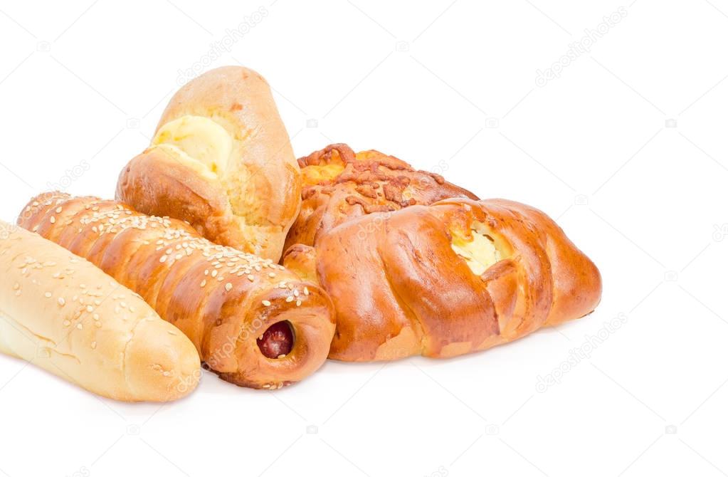 Pile of different bakery products on a white background