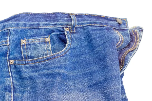 Fragment of the used classical blue jeans on white background — Stock Photo, Image