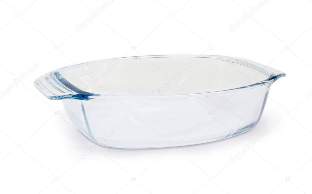 Empty glass casserole pan on a white background