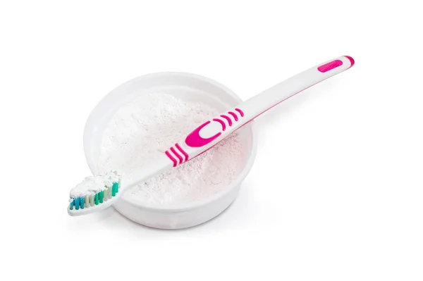 Toothbrush with toothpowder on an open box of toothpowder — Stock Photo, Image