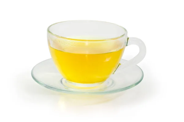 Grüner Tee in Glasschale auf Glasuntertasse — Stockfoto