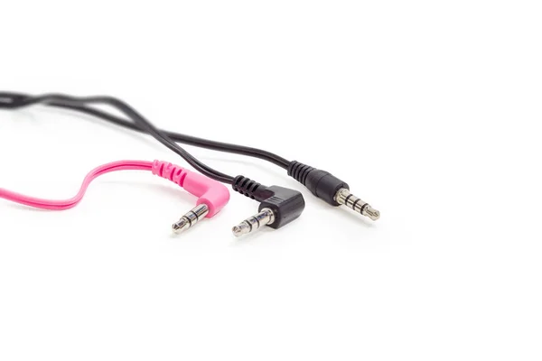 Three different audio plugs with parts of cables closeup — Stock Photo, Image