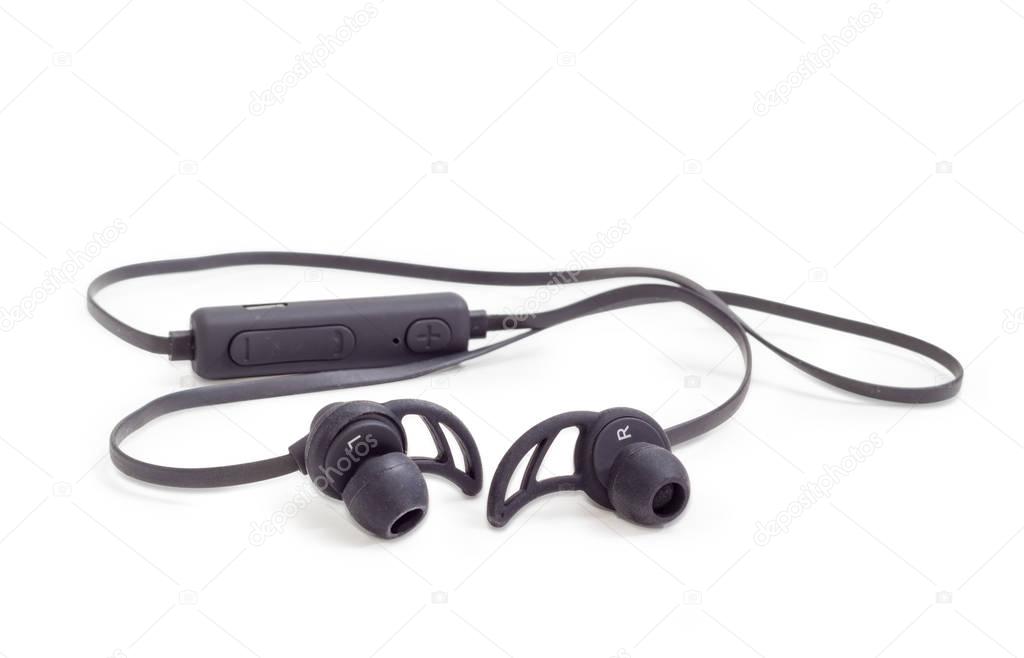 Black wireless earphones on a white background