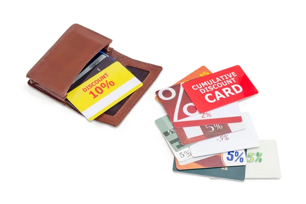 Discount cards in brown leather wallet and beside to him — Stock Photo, Image