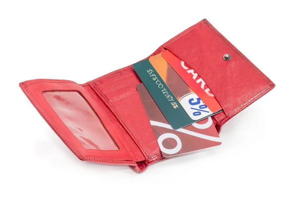 Discount cards in open red leather wallet