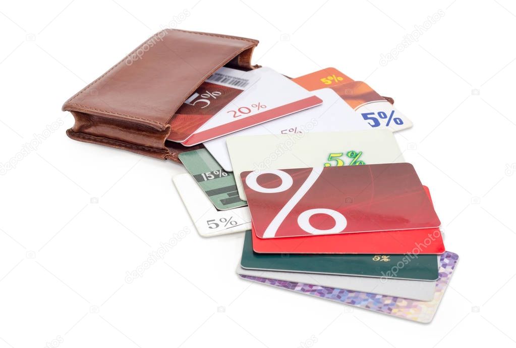 Discount cards in brown leather wallet on a white background