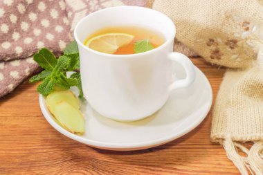 Çay limon, nane, zencefil ile karşı yün eldiven eşarp 