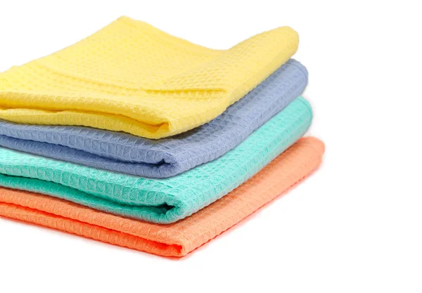 Conjunto de toallas de gofre multicolores plegadas primer plano con selectivo — Foto de Stock