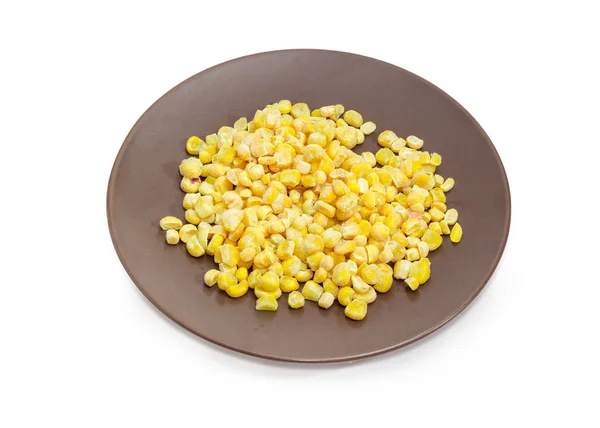 Nueces congeladas de maíz dulce en el plato marrón — Foto de Stock