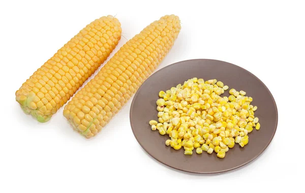 Frozen sweet corn kernels on dish against of fresh corn — Stock Photo, Image