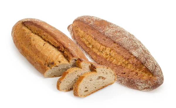 Pão integral e parcialmente fatiado com grãos de trigo germinados — Fotografia de Stock