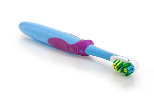 Escova de dentes elétrica padrão close-up no foco seletivo — Fotografia de Stock