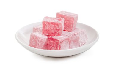 Türk lokumu beyaz daire üzerinde gül suyu ile aromalı