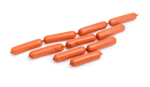 Uncooked thin long wieners on a white background — Stock Photo, Image