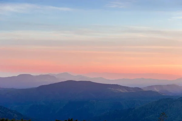 Mountain ranges in Carpathian Mountains at sunset — Stock Photo, Image