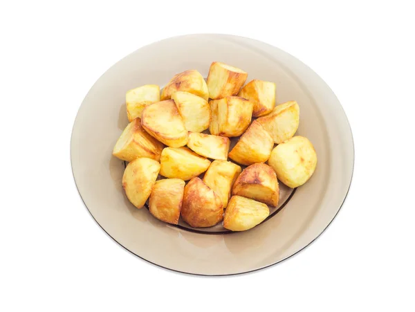Смажена картопля на темній скляній тарілці — стокове фото