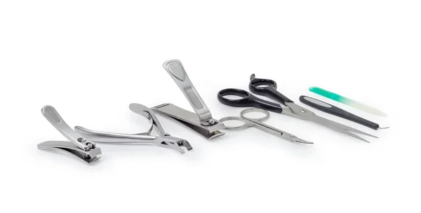 Different tools for nail care closeup on a white background — Stock Photo, Image