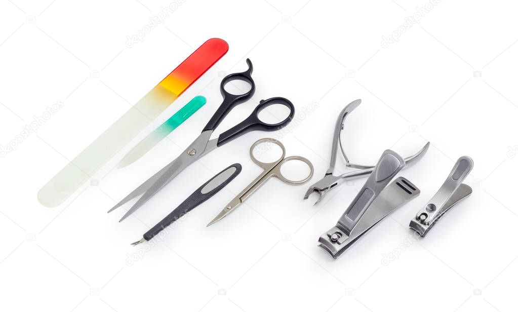Different tools for nail care on a white background