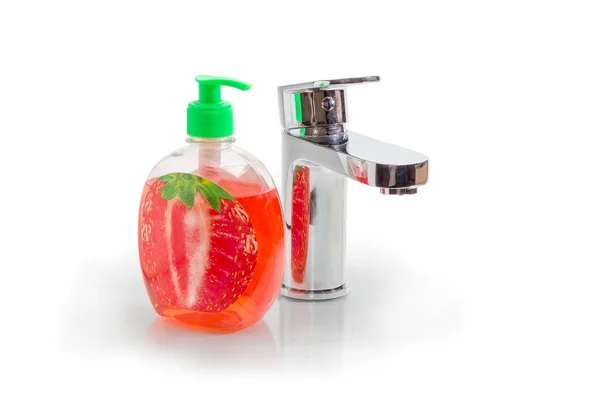 Handle mixer tap and liquid soap in bottle with pump — Stock Photo, Image