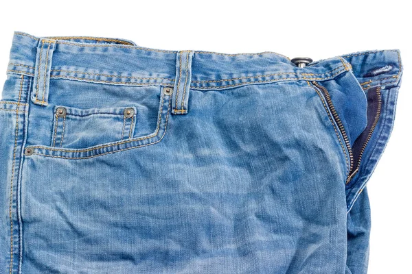 Fragment der gebrauchten zerknitterten blauen Jeans auf weißem Hintergrund — Stockfoto