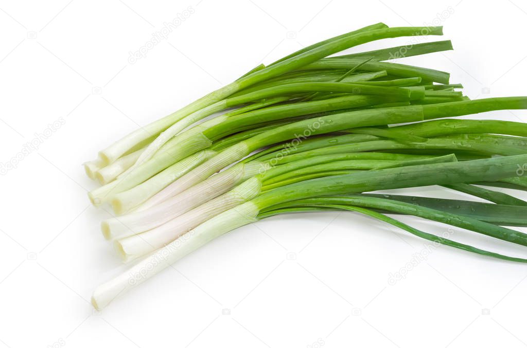Bunch of the peeled green onion on a white background