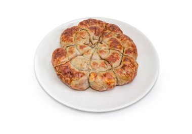 Ev yapımı domuz sosisi bir sarmal tarafından kısıtlandığını pişmiş