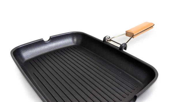 Fragment of rectangular grill pan at selective focus — Stock Photo, Image