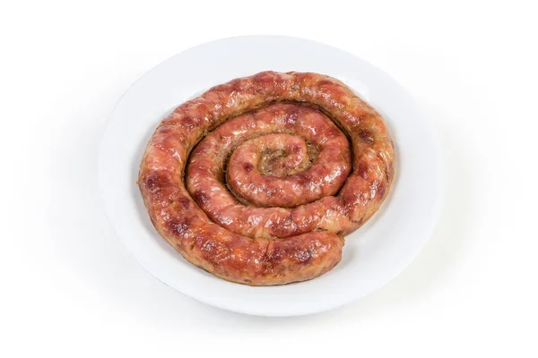 Salsiccia di maiale fatta in casa al forno ridotta da una spirale — Foto Stock