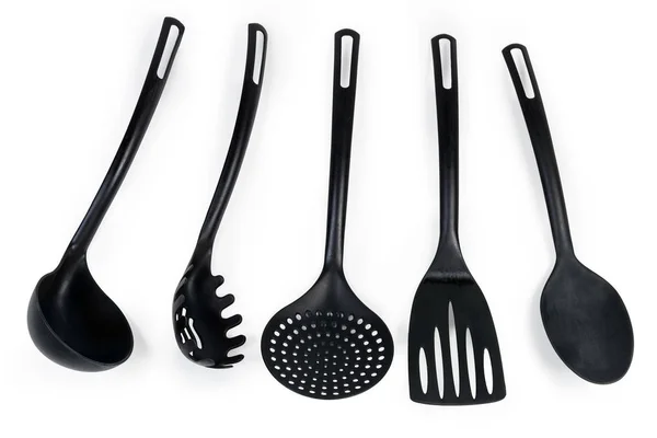 Different plastic cooking utensils on a white background — 스톡 사진