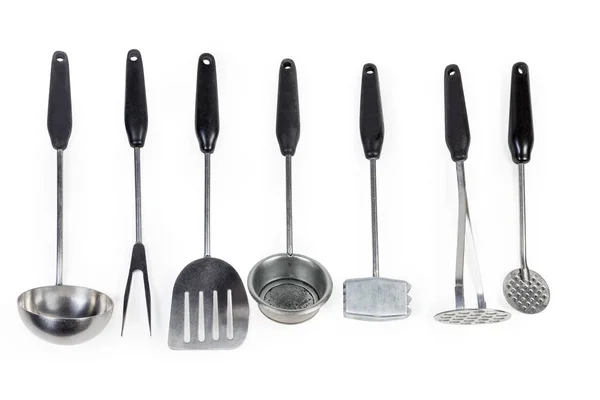 Conjunto de diferentes utensílios de cozinha sobre um fundo branco — Fotografia de Stock