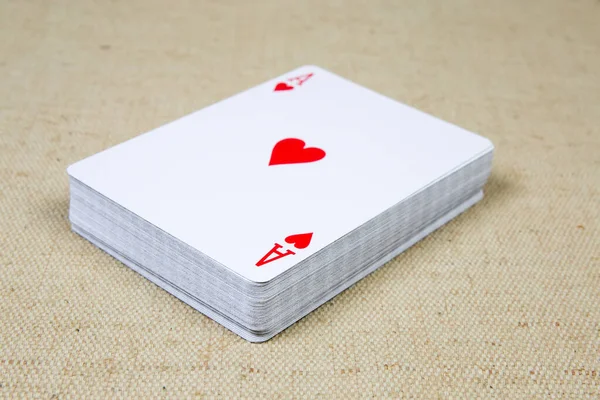 Deck of playing cards with ace hearts card on top —  Fotos de Stock