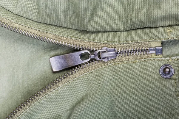 Metal zipper and snap button fastener on outerwear close-up — Stock Photo, Image