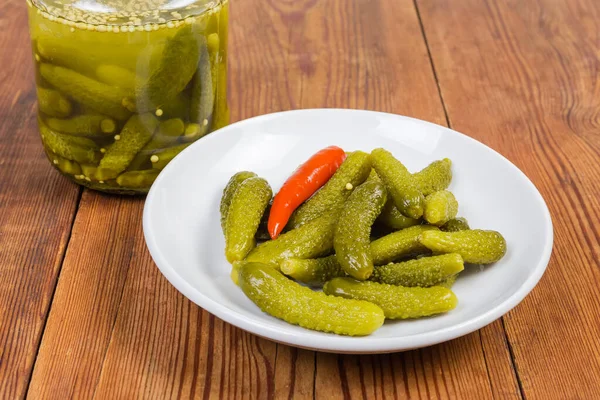 Pickled Tiny Cucumbers Also Called Gherkins White Saucer Small Glass — Stock Photo, Image