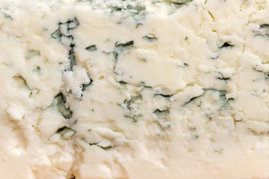 Mavi peynirin dokusu mavi-gri küf ile yakın plan, arka plan