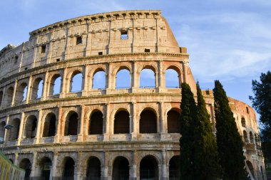 Archs of Colosseo in Rome Italy without tourists with special sunlight clipart