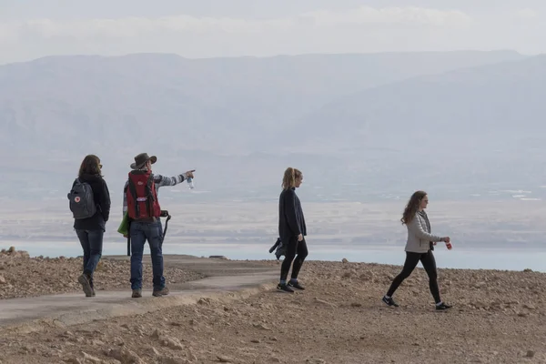 Tourists walking in desert, Masada, Judean Desert, Dead Sea Region, Israel