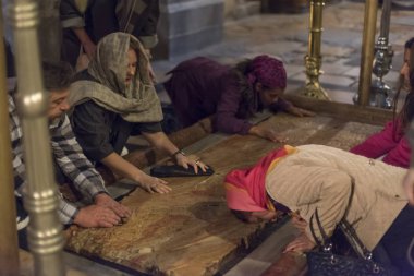 The Stone of Anointing where Jesus' body is said to have been anointed before burial, Church of Holy Sepulchre, Jerusalem, Israel clipart