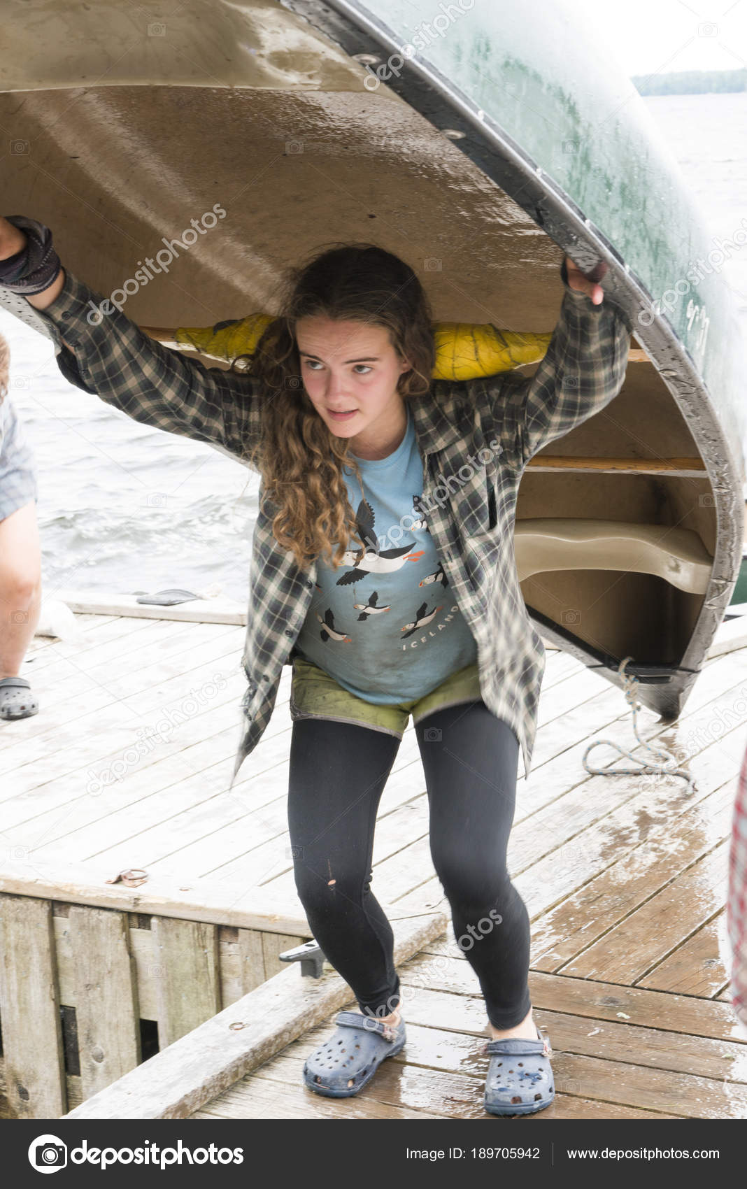 Teenage Girl Carrying Canoe Her Head Camp Lake Woods Ontario Stock